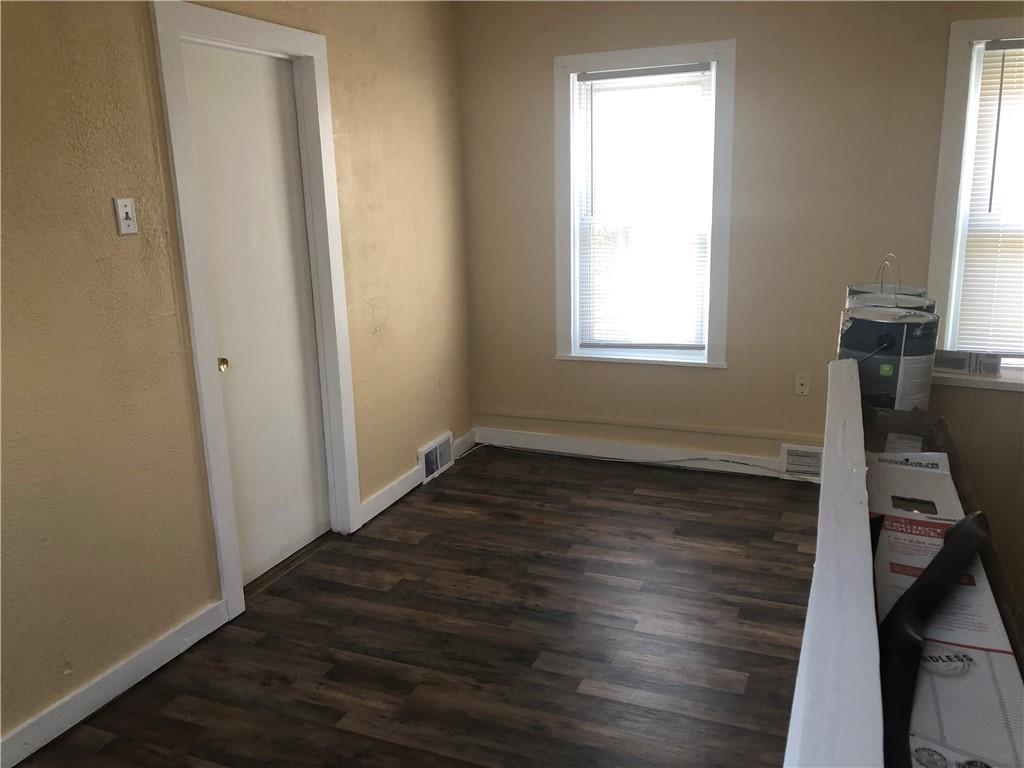 1218 Sharon Road Beaver, PA 15009 - Photo 14 of 17 a view of a room with wooden floor and a window