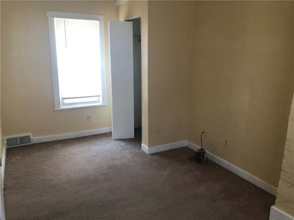 1218 Sharon Road Beaver, PA 15009 - Photo 16 of 17 an empty room with a window