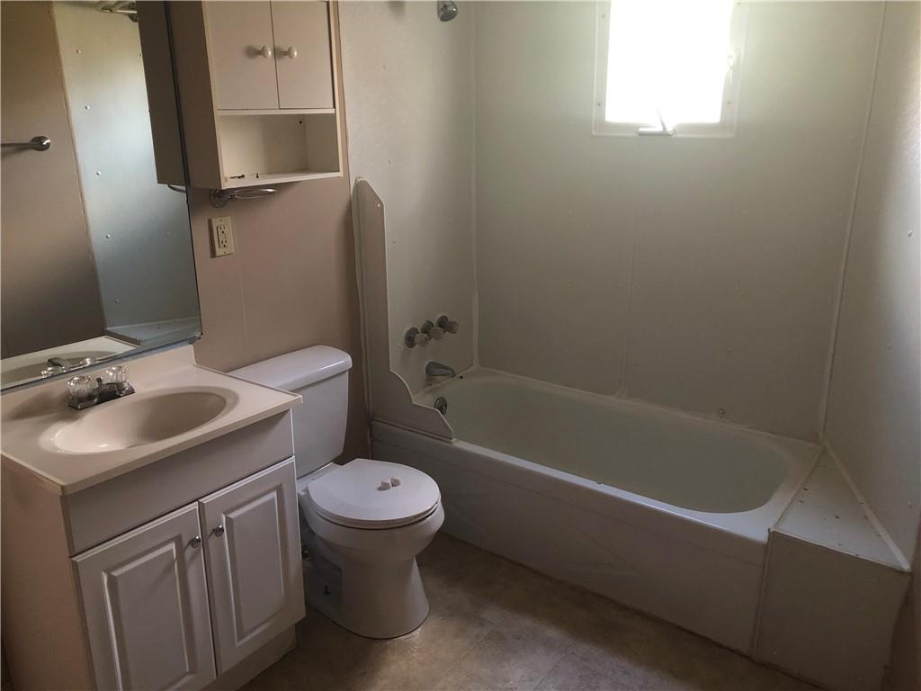 1218 Sharon Road Beaver, PA 15009 - Photo 8 of 17 a bathroom with a sink toilet and shower