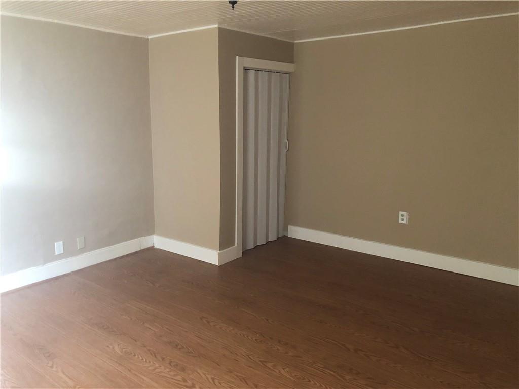 1218 Sharon Road Beaver, PA 15009 - Photo 10 of 17 an empty room with an empty space