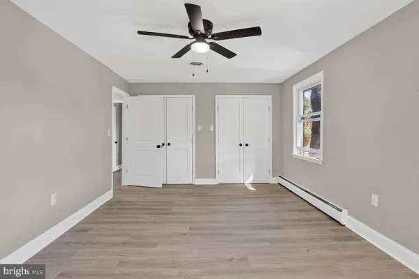 a view of kitchen with wooden floor
