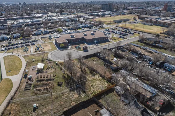 an aerial view of a house with swimming pool