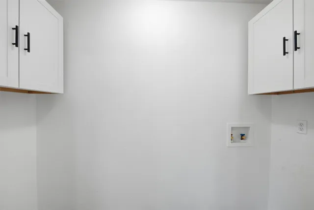 a view of a dining room with furniture and window