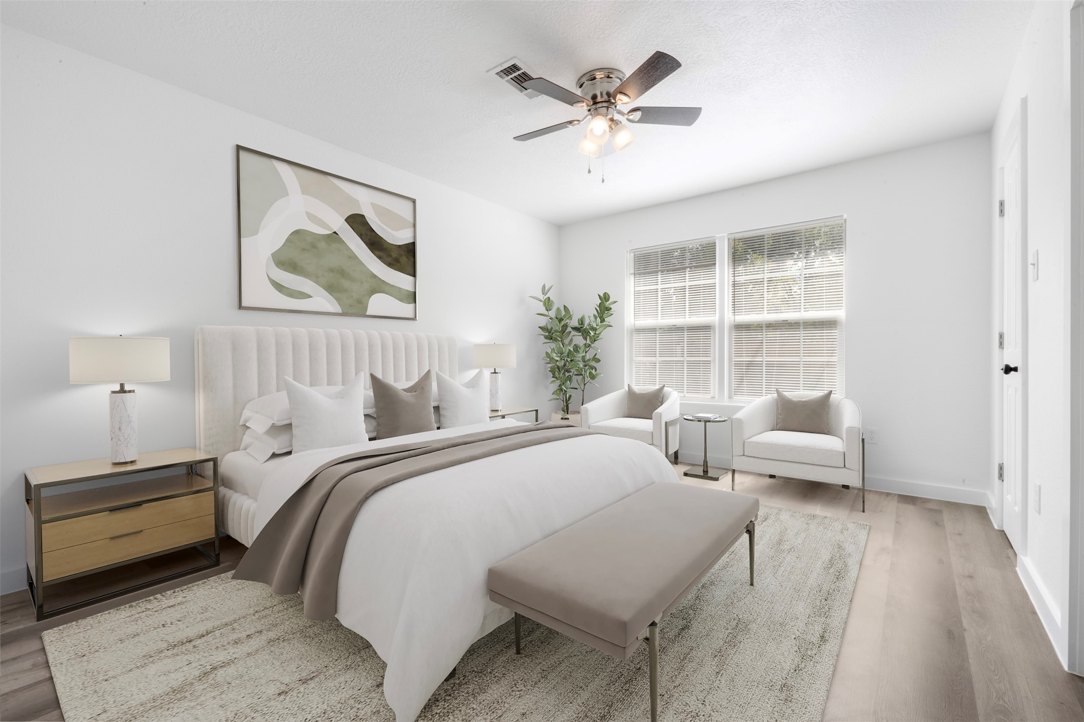 111 Calvin Street Pasadena, TX 77506 - Photo 20 of 40 a spacious bedroom with a bed a couch and a window