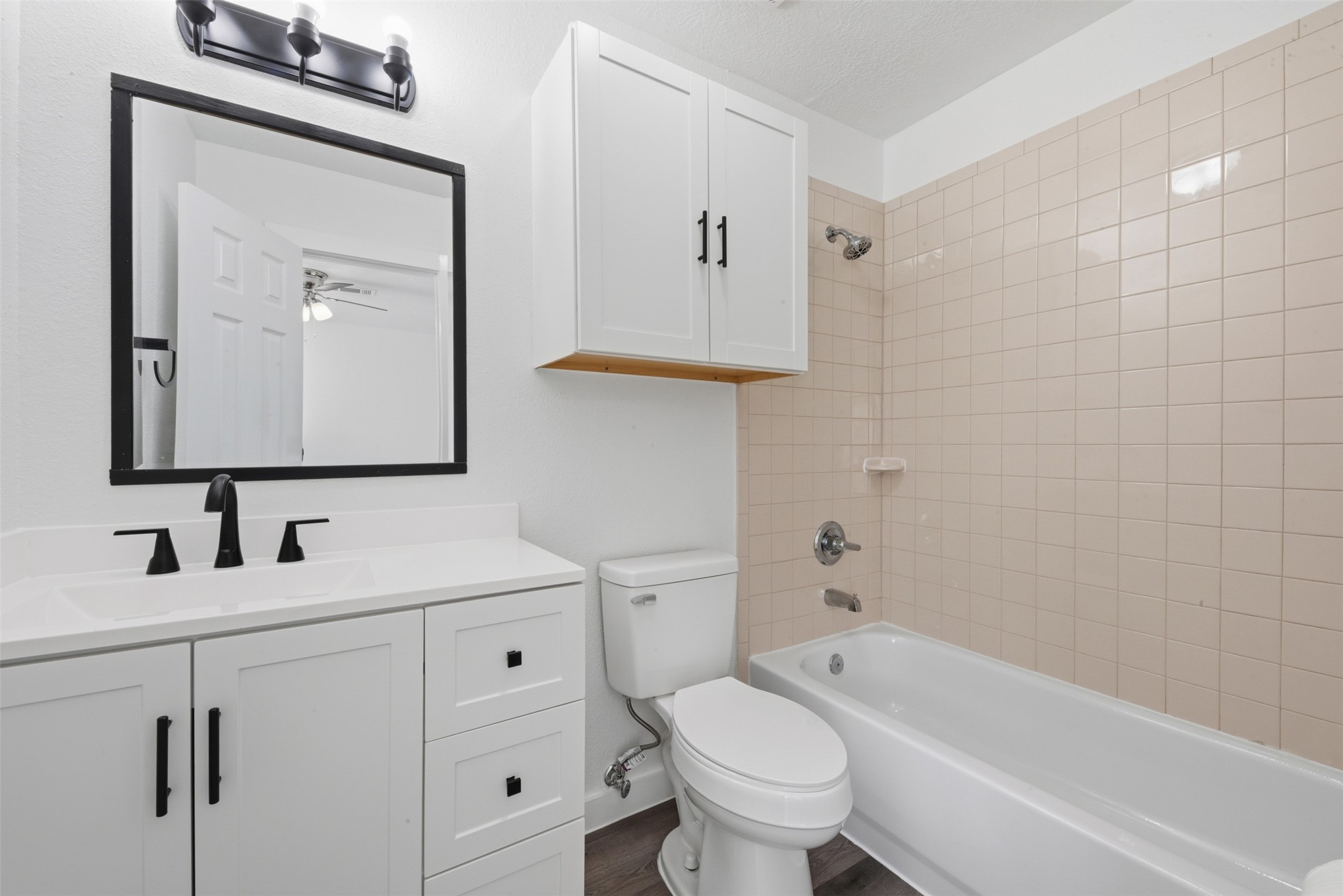 111 Calvin Street Pasadena, TX 77506 - Photo 23 of 40 a bathroom with a toilet sink and bathtub