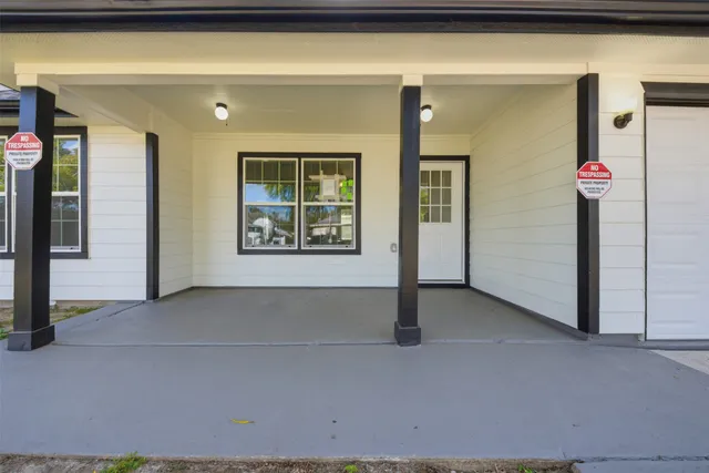 a front view of a house with an outdoor space