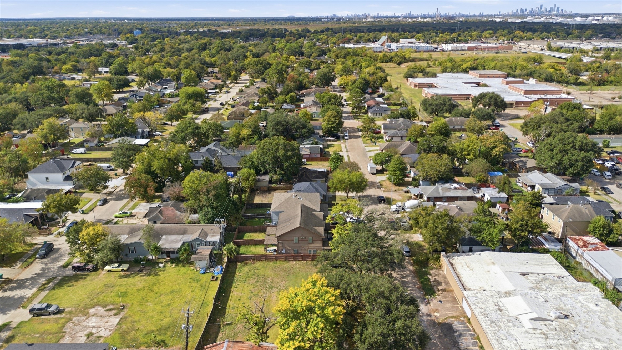 111 Calvin Street Pasadena, TX 77506 - Photo 36 of 40 an aerial view of residential houses with outdoor space and swimming pool