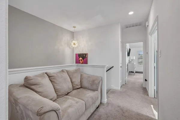 a living room with furniture and a couch