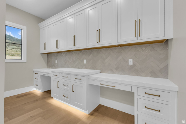 2828 Jojo Road Eagle Mountain, UT 84005 - Photo 19 of 63 Built-in cabinetry featuring white shaker-style doors and brass hardware