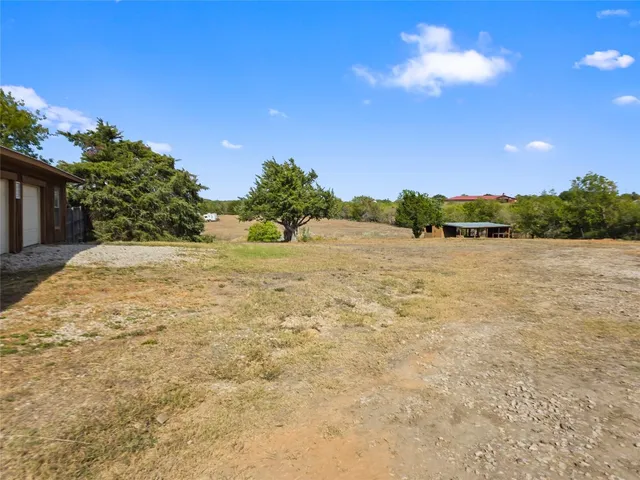 a view of lake with sunset