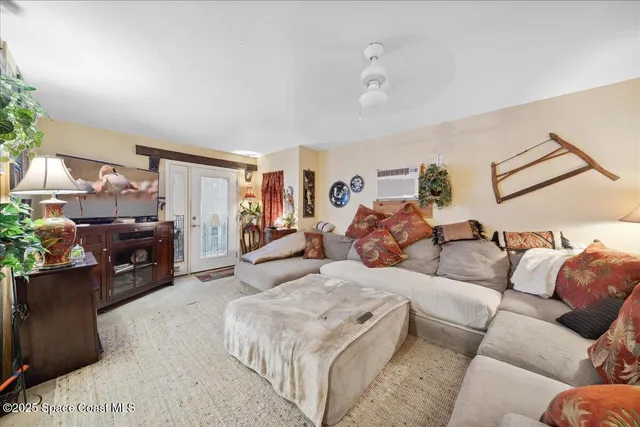 a open kitchen with stainless steel appliances granite countertop a stove and a refrigerator