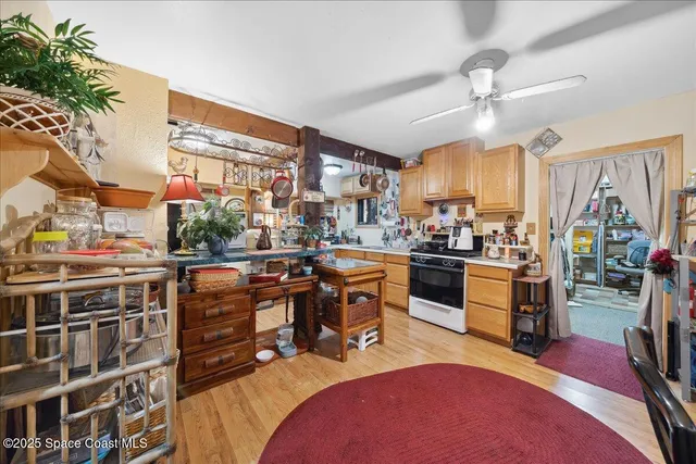 a view of a kitchen and dining room