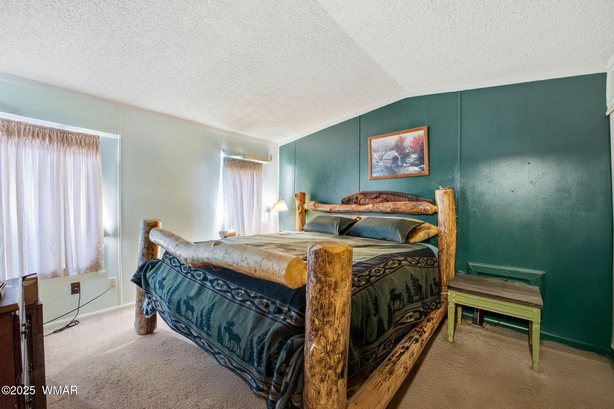 703 East Frontier Street, Unit 31 Payson, AZ 85541 - Photo 9 of 21 a bedroom with a bed and a window