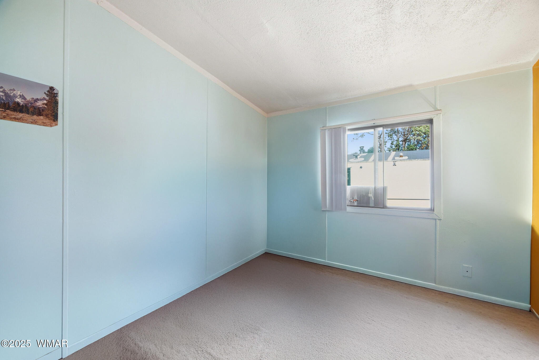 703 East Frontier Street, Unit 31 Payson, AZ 85541 - Photo 12 of 21 a view of an empty room with a window