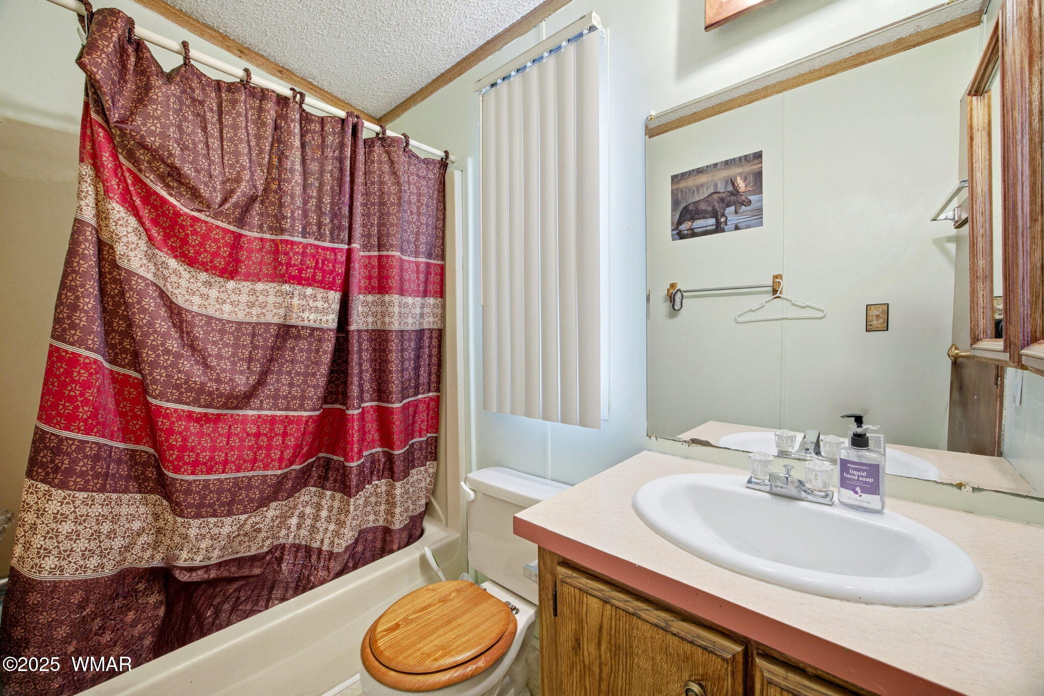 703 East Frontier Street, Unit 31 Payson, AZ 85541 - Photo 13 of 21 a bathroom with a sink and a mirror