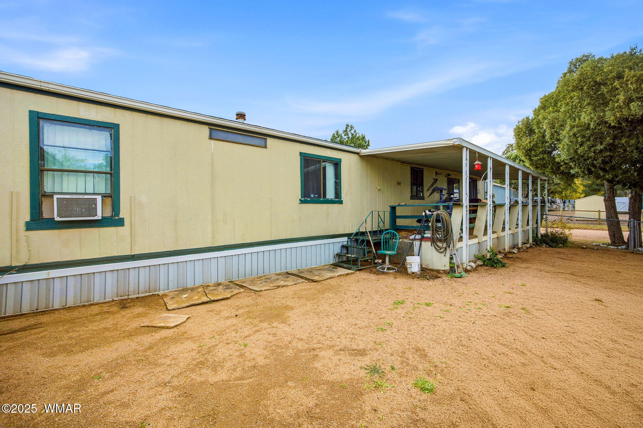 703 East Frontier Street, Unit 31 Payson, AZ 85541 - Photo 17 of 21 a view of a house with a patio