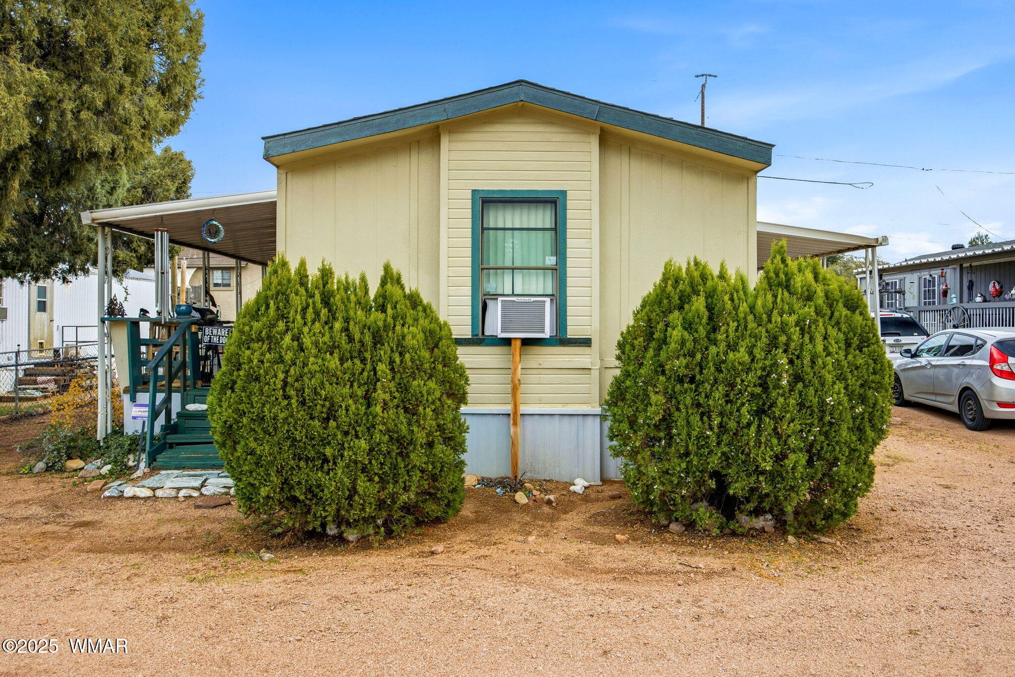 703 East Frontier Street, Unit 31 Payson, AZ 85541 - Photo 2 of 21 a front view of a house with garden