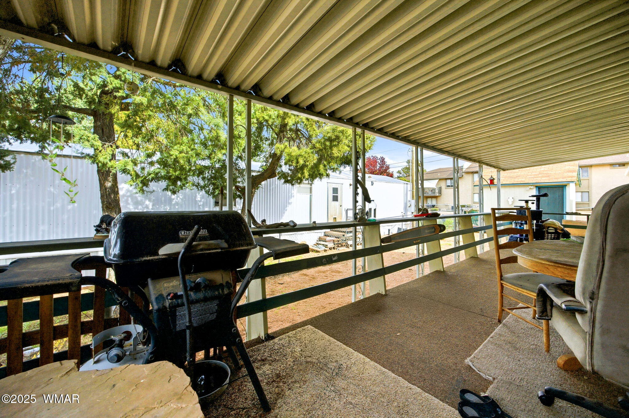 703 East Frontier Street, Unit 31 Payson, AZ 85541 - Photo 4 of 21 a view of a patio with table and chairs and potted plants