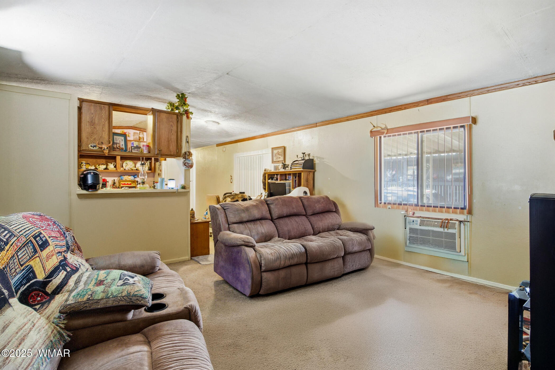 703 East Frontier Street, Unit 31 Payson, AZ 85541 - Photo 6 of 21 a living room with furniture and a window