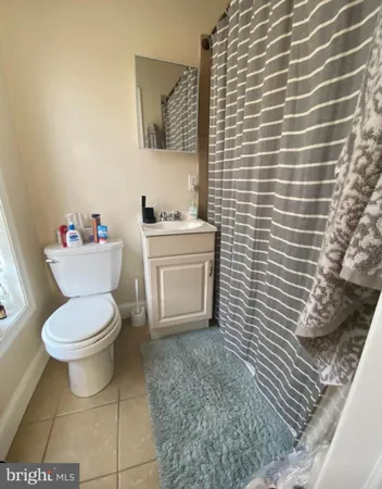 a bathroom with a toilet and a sink