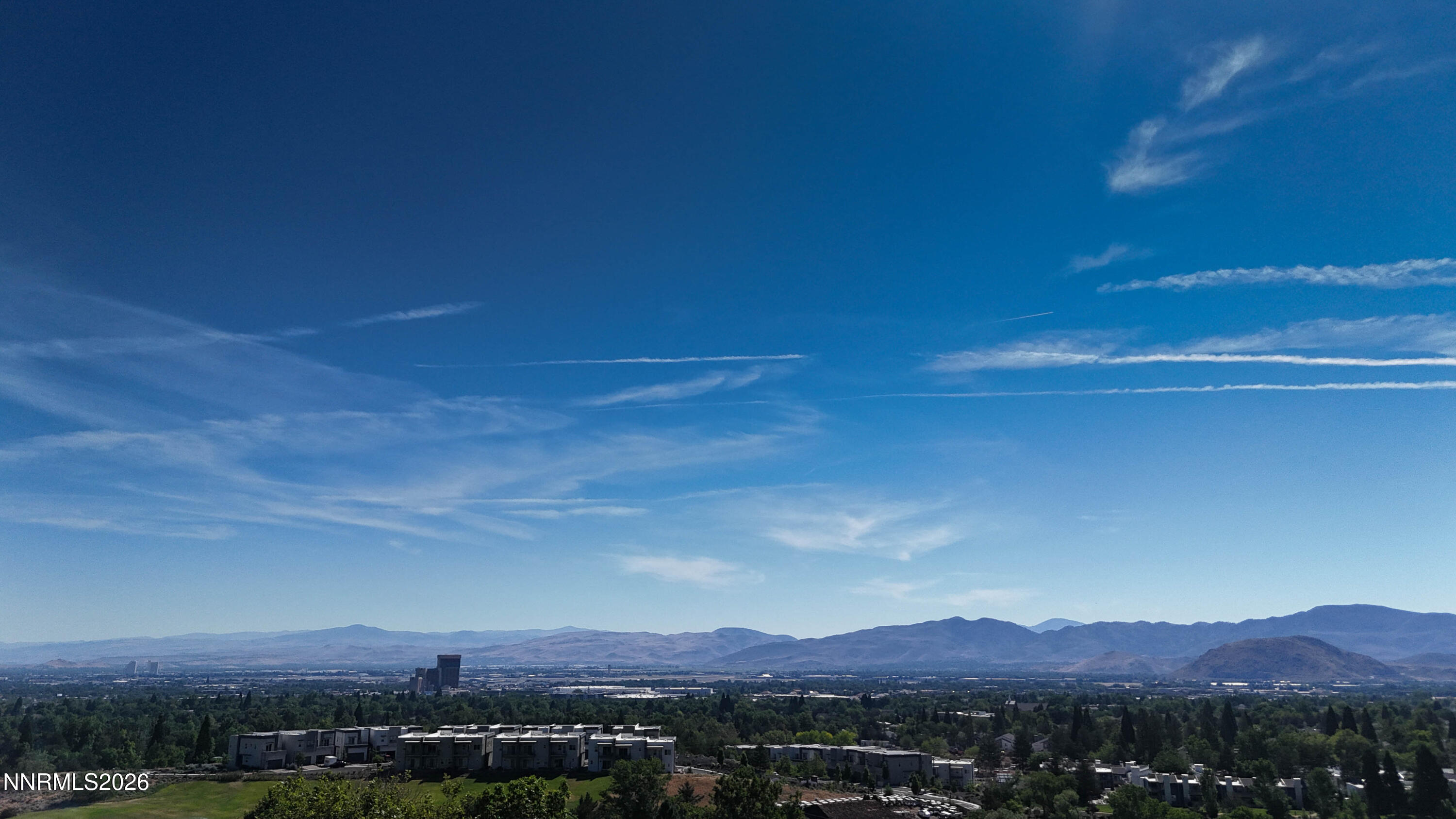 2640 Rockview Drive Reno, NV 89519 - Photo 55 of 56 a view of a lake with a mountain in the background