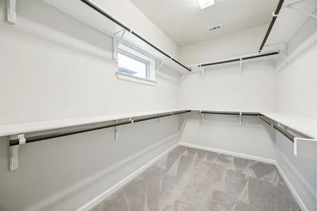 a view of a room with racks on the wall