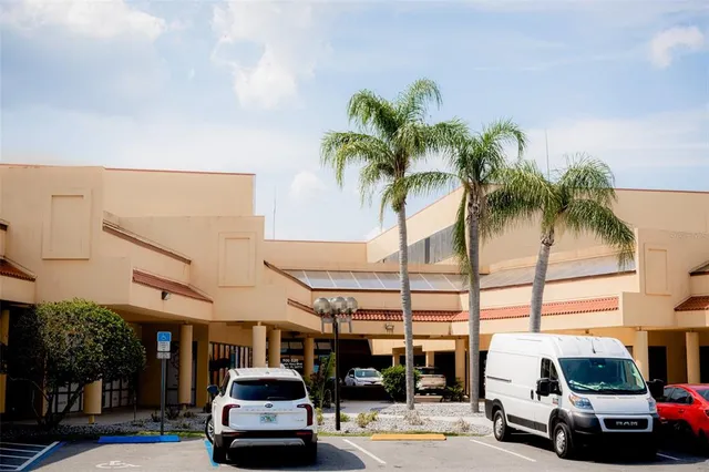 a view of a cars parked in front of a building