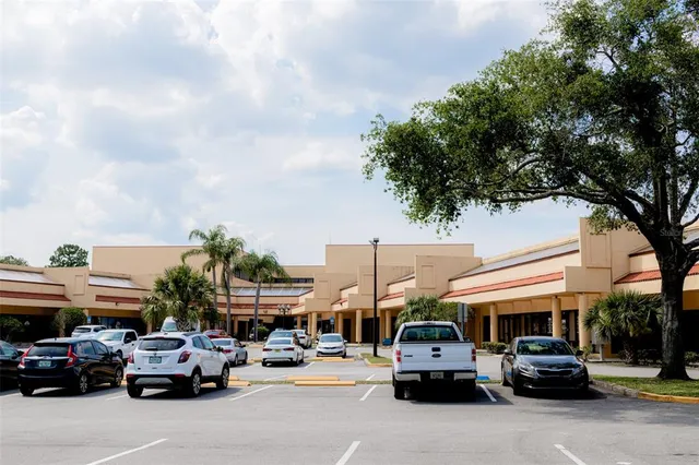 a view of cars parked in front of a building
