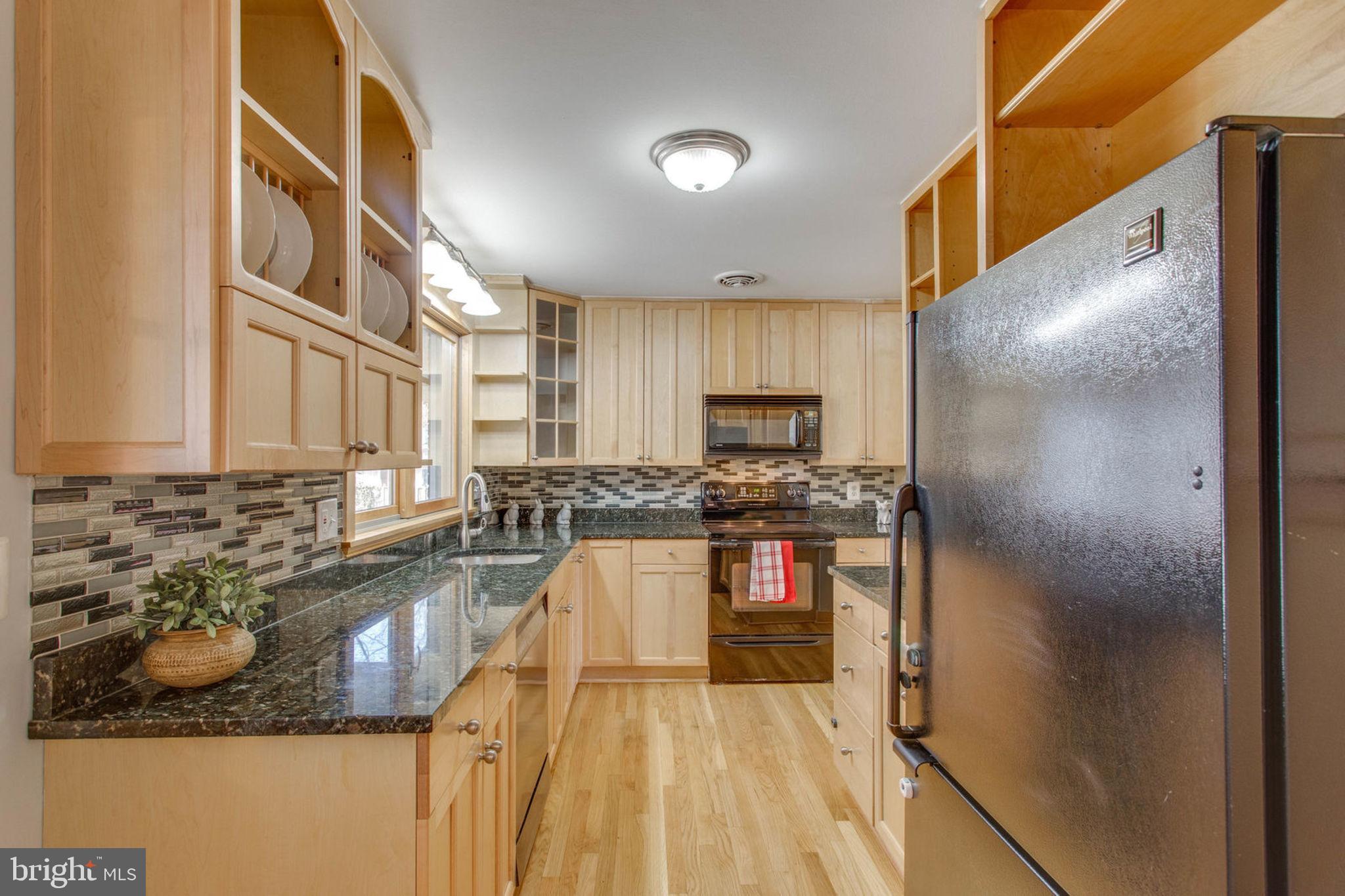 6808 Hackberry Street Springfield, VA 22150 - Photo 23 of 50 A cooks two step kitchen for efficiency