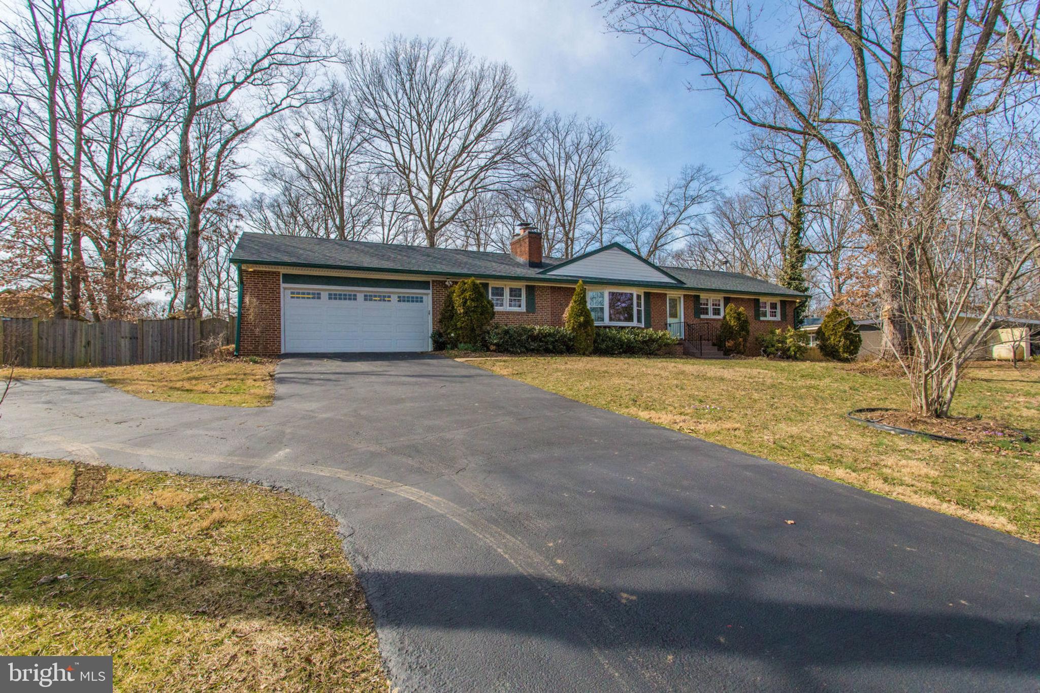 6808 Hackberry Street Springfield, VA 22150 - Photo 6 of 50 Extended driveway for more parking.