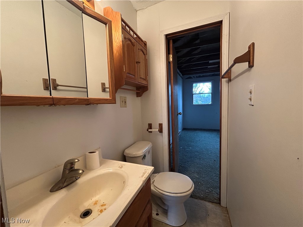 796 Rokeby Road Eastlake, OH 44095 - Photo 16 of 23 Half bathroom with vanity and toilet