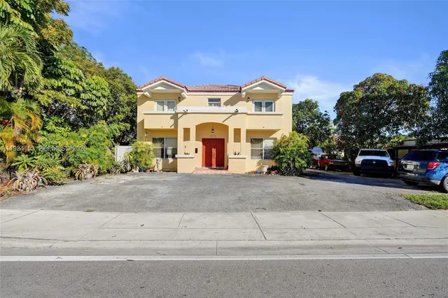 front view of a house with a street