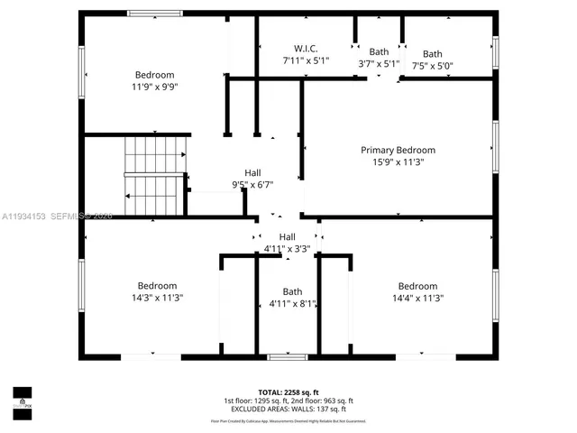 a picture of a wall with a white building