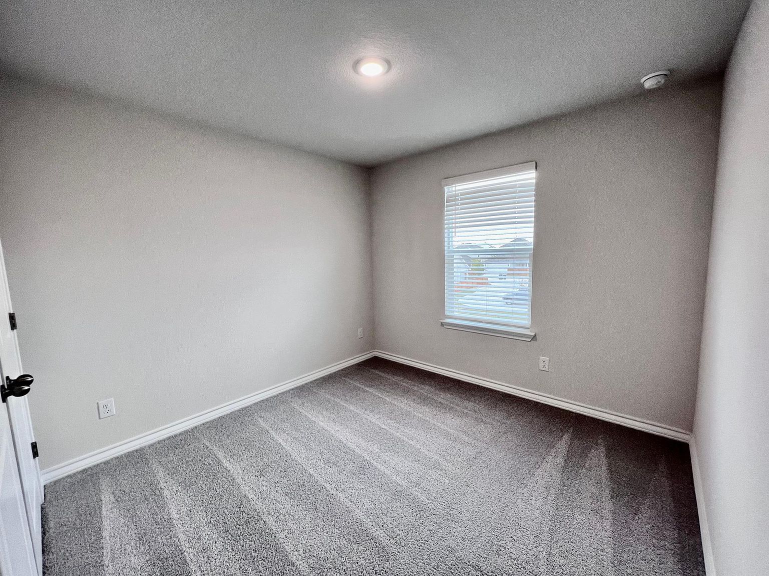 4701 Lavender Field Path, Unit 186 Austin, TX 78723 - Photo 23 of 29 an empty room with windows