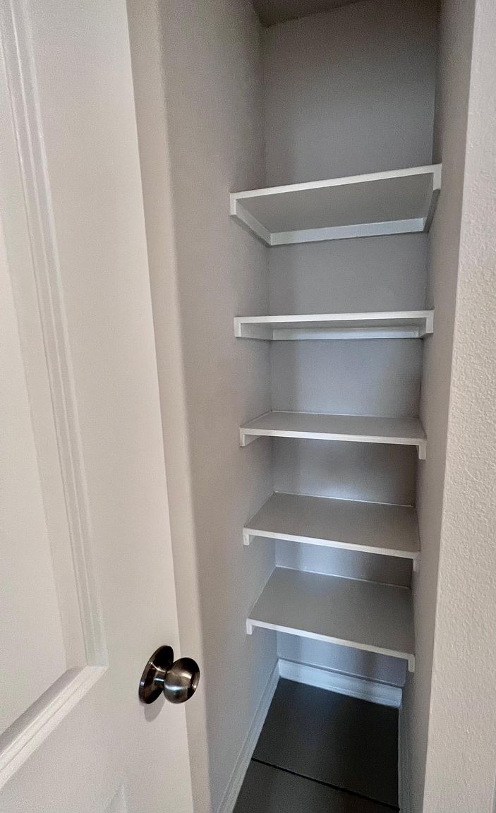 4701 Lavender Field Path, Unit 186 Austin, TX 78723 - Photo 26 of 29 a view of walk in closet with empty racks