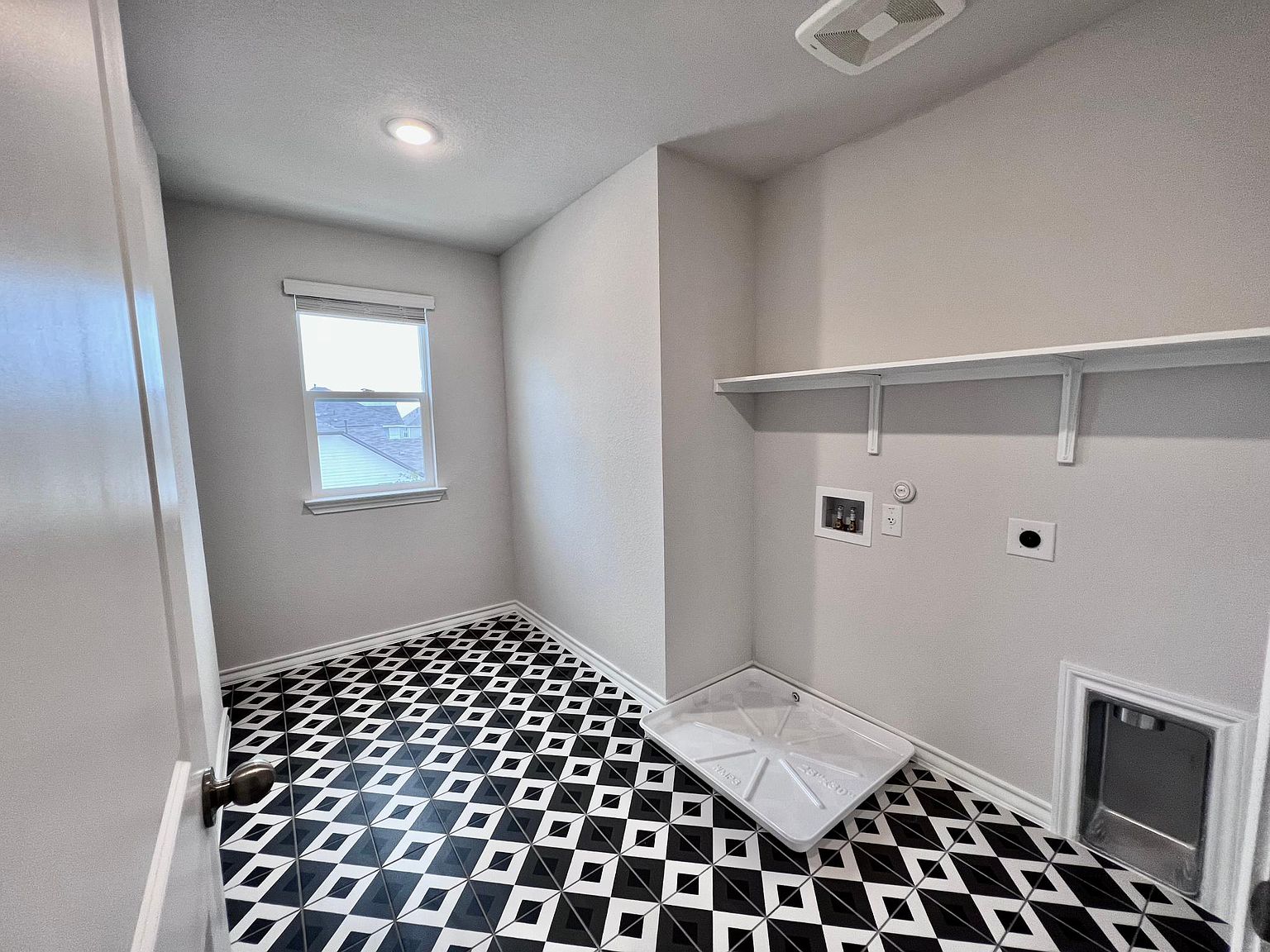 4701 Lavender Field Path, Unit 186 Austin, TX 78723 - Photo 27 of 29 a bedroom with a bed and a window