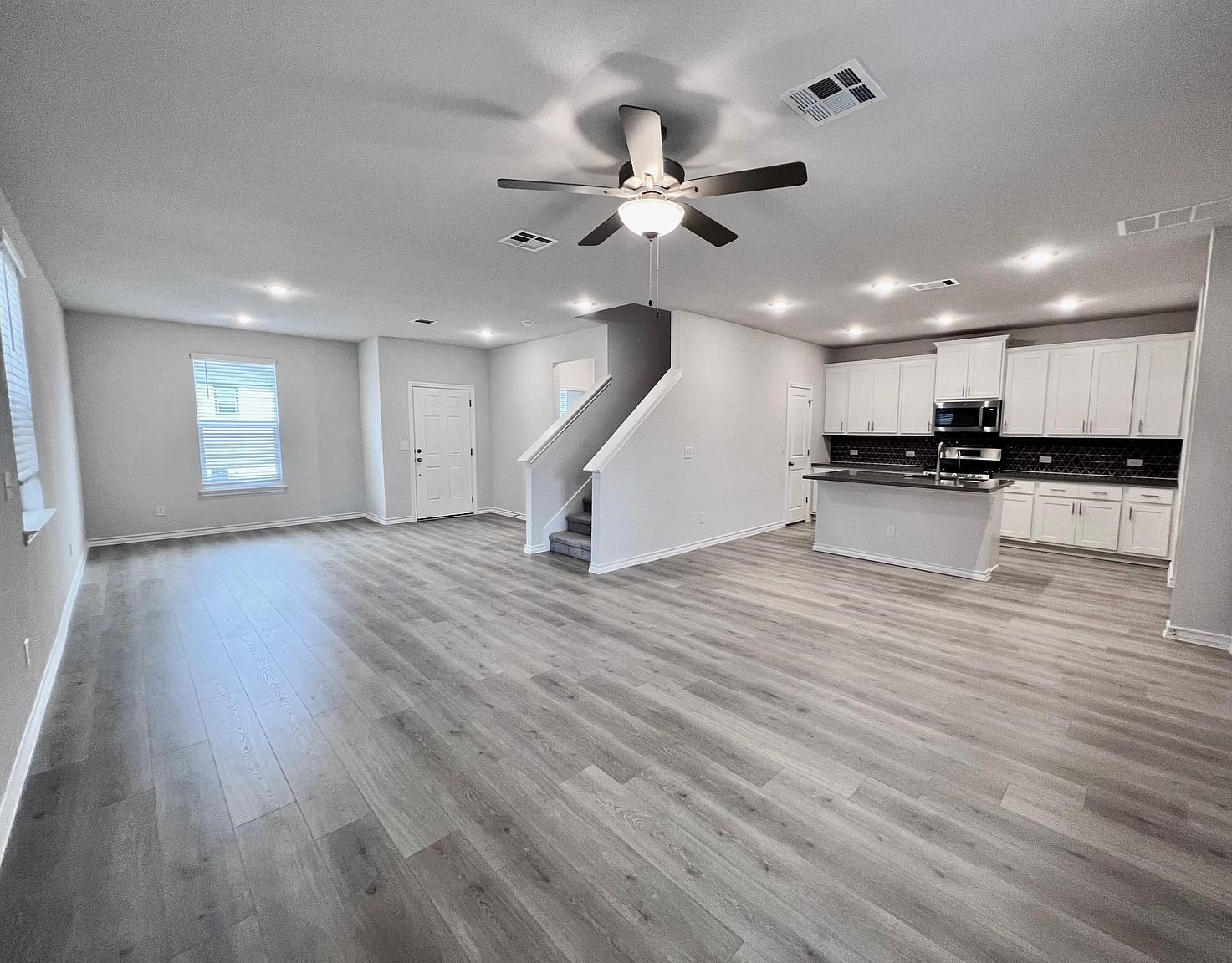 4701 Lavender Field Path, Unit 186 Austin, TX 78723 - Photo 7 of 29 a view of kitchen with sink and wooden floor