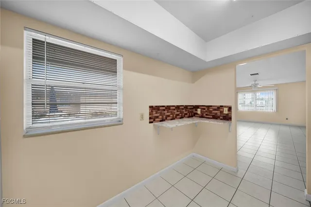 a view of walk in closet with window