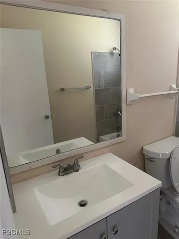 a bathroom with a sink and a toilet