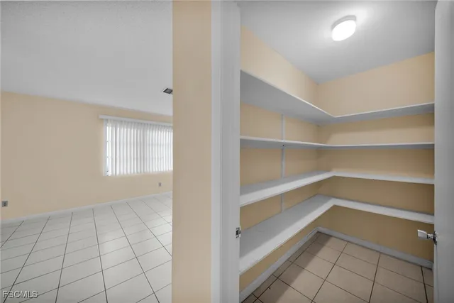 a view of an empty walk in closet