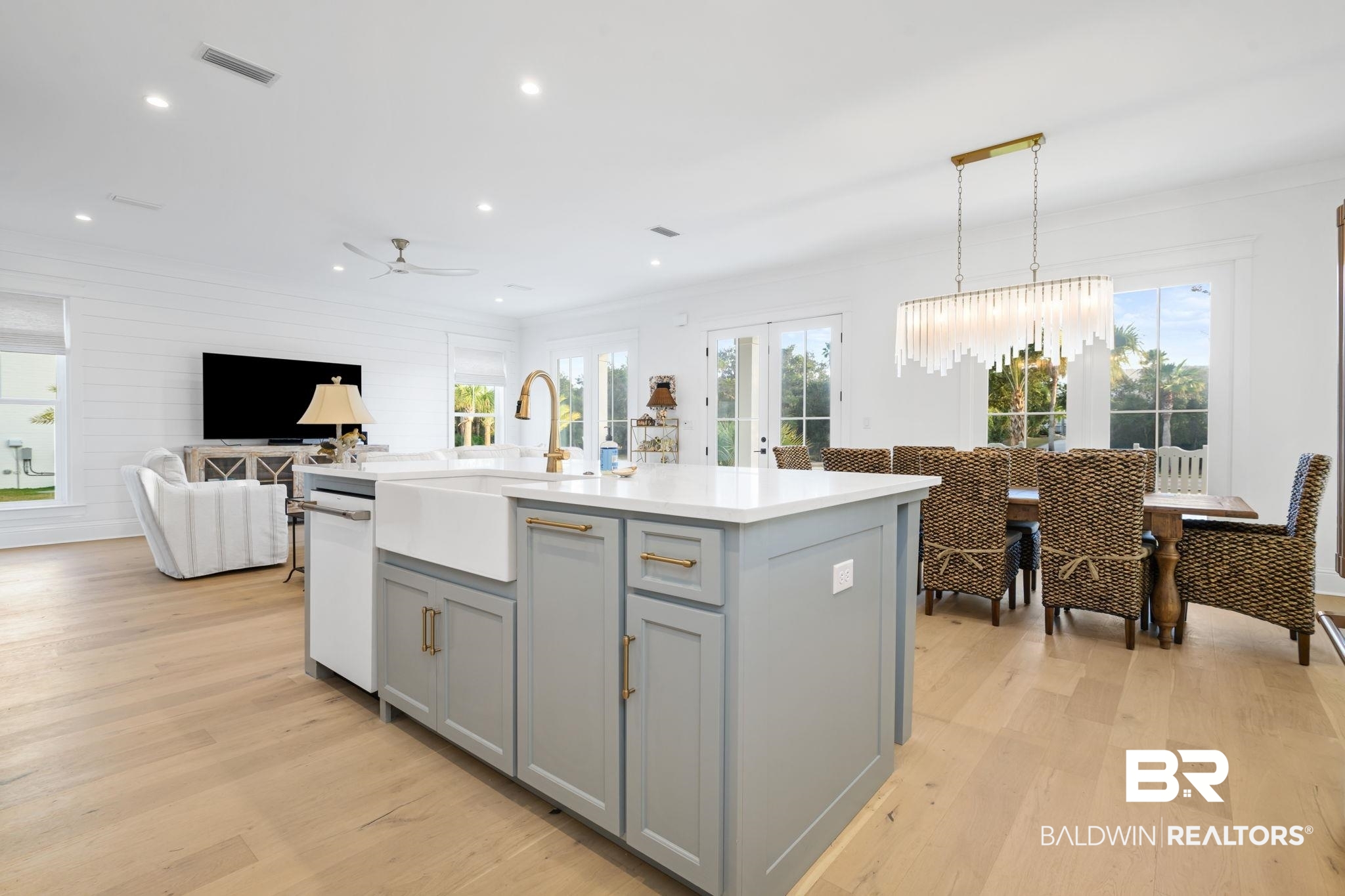 30313 River Road Orange Beach, AL 36561 - Photo 50 of 50 Kitchen with gray cabinetry, open floor plan, plenty of natural light, light wood-style flooring, and recessed lighting