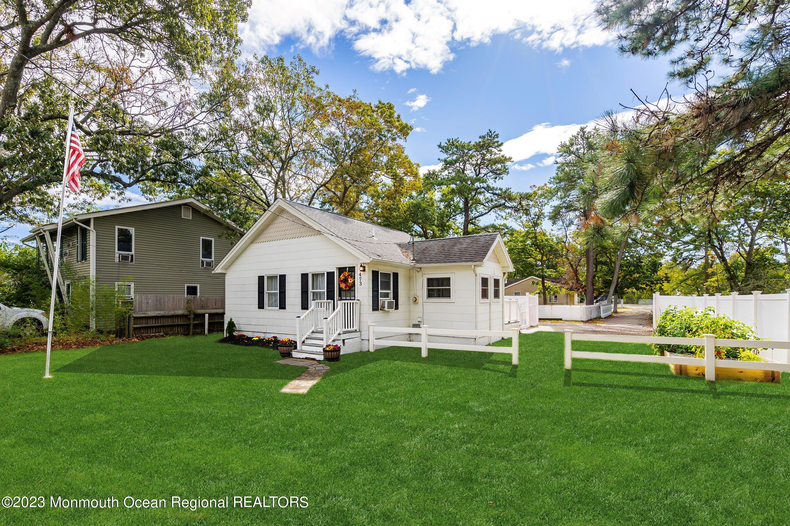 473 Mantoloking Road Brick, NJ 08723 - Photo 2 of 32 04-Front Right GRASS