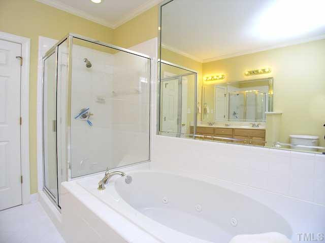 7413 Fontana Ridge Lane Raleigh, NC 27613 - Photo 15 of 25 Jetted whirpool tub for relaxing at the end of your day.