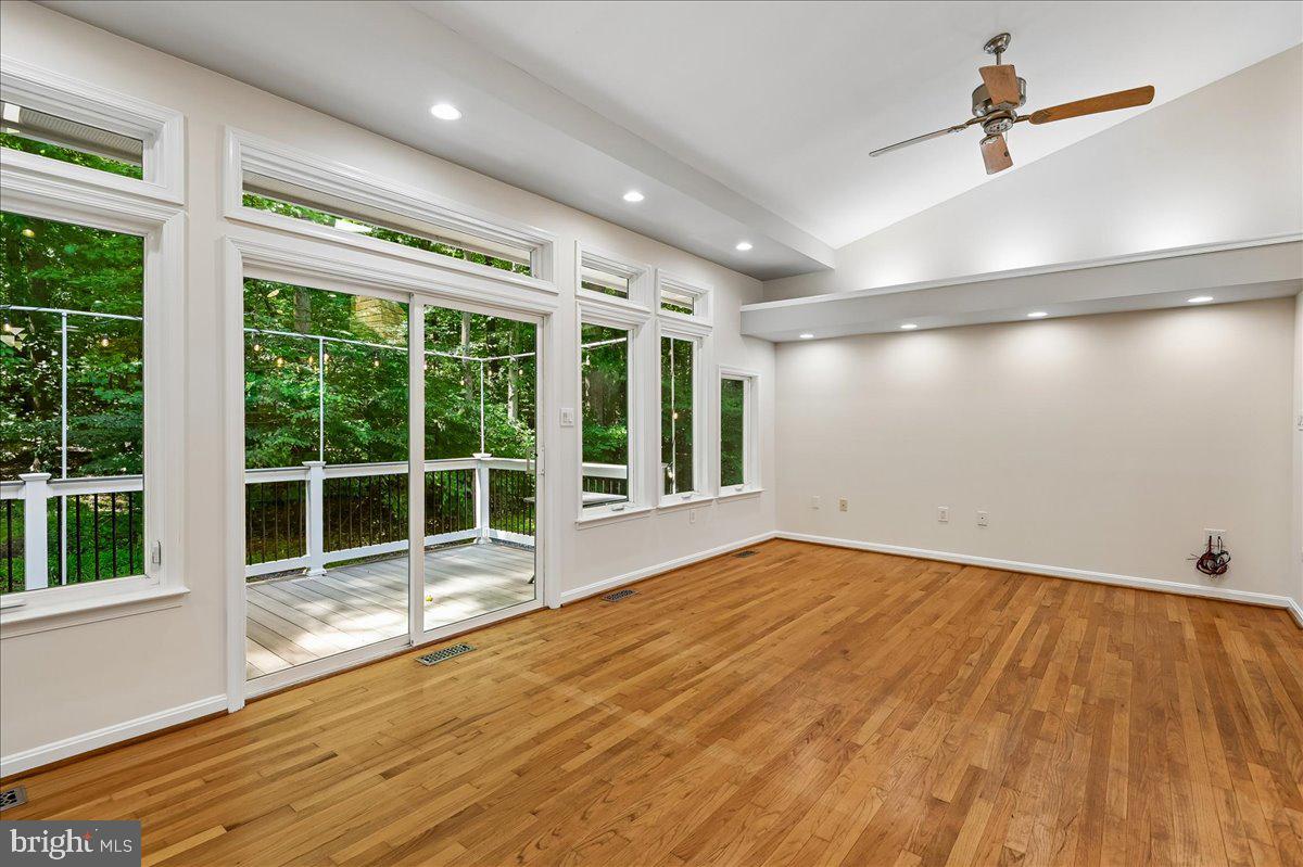 3633 Patuxent River Road Davidsonville, MD 21035 - Photo 5 of 85 Great Room Wall of Glass and Soffit Lighting