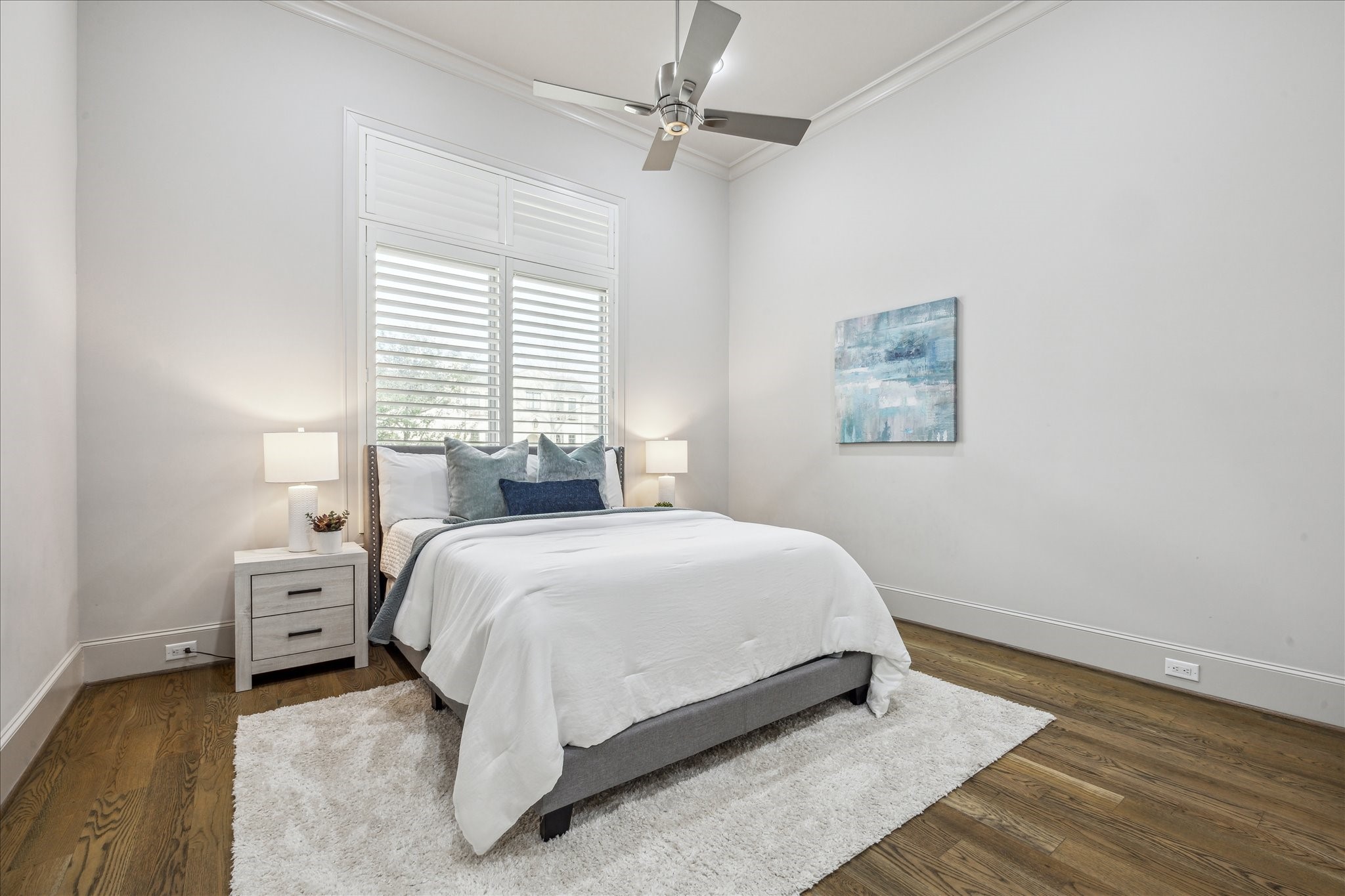 4615 Verone Street Bellaire, TX 77401 - Photo 17 of 43 a bedroom with a bed and a window