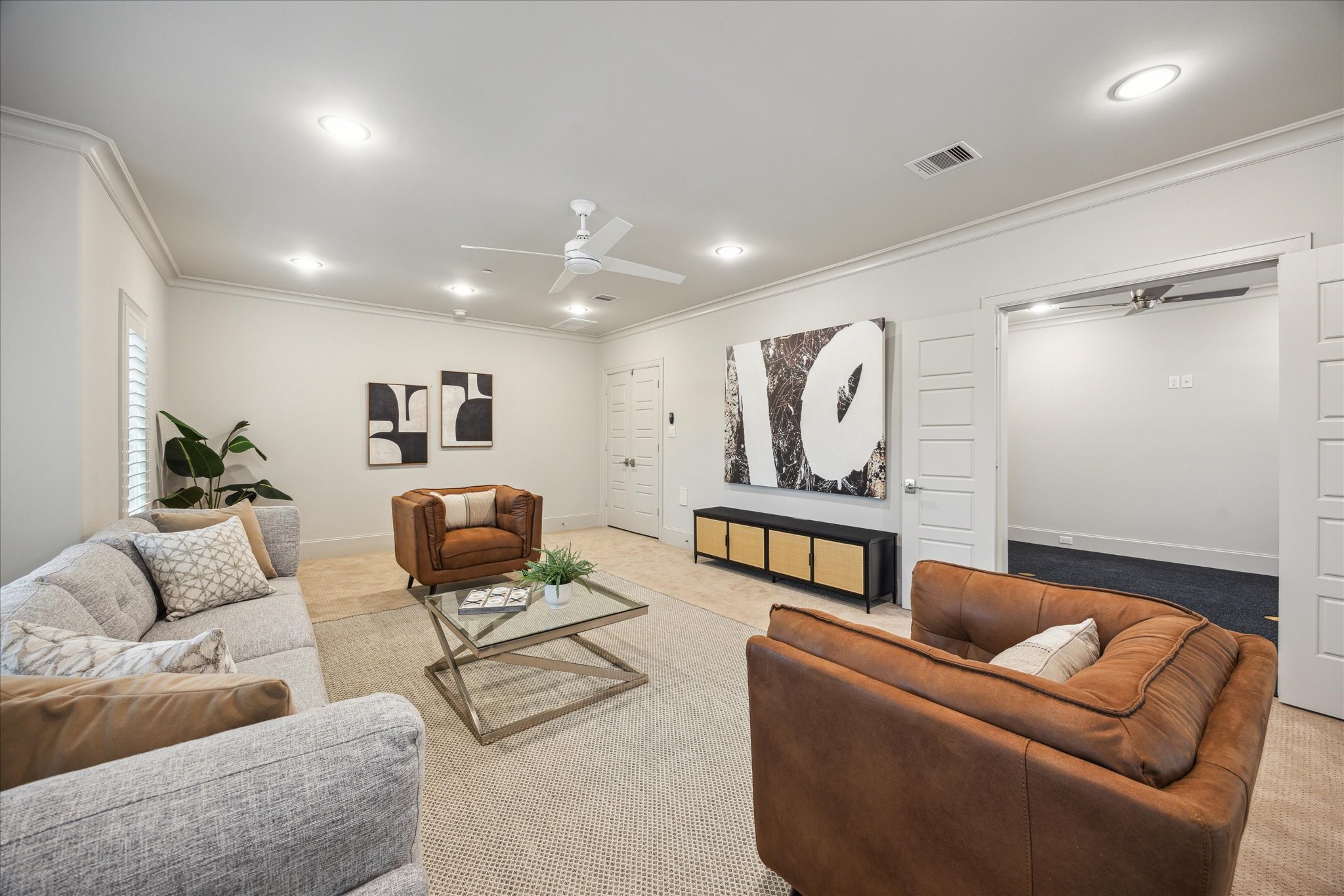 4615 Verone Street Bellaire, TX 77401 - Photo 29 of 43 a living room with furniture and a wooden floor
