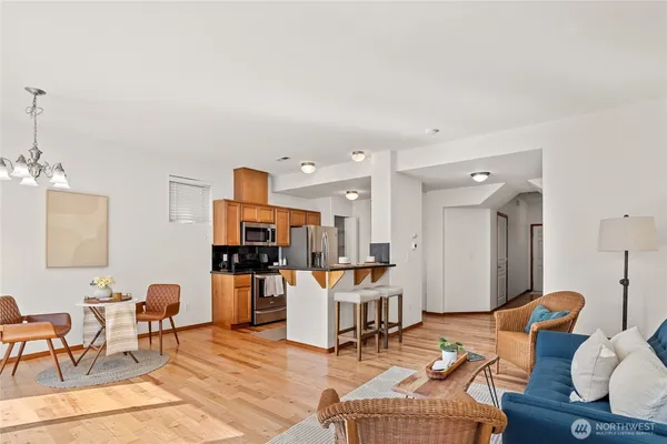 a living room with furniture and a table