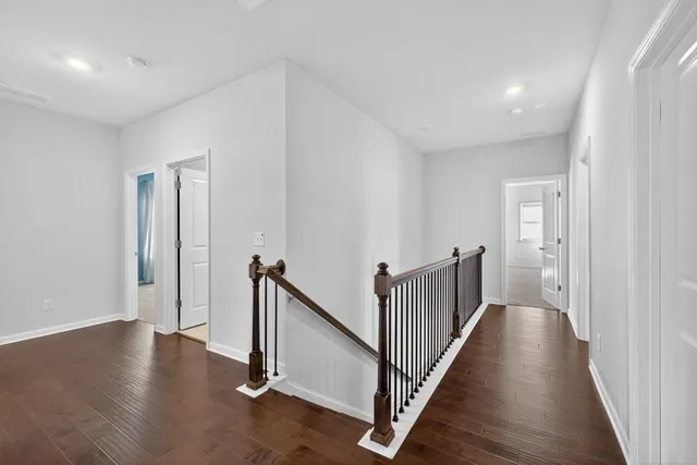 a bathroom with a toilet and bathtub