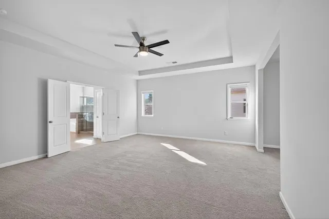 a large bathroom with a double vanity sink and a mirror