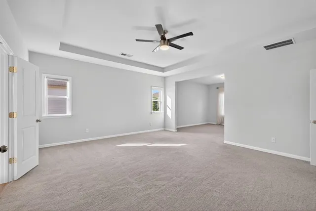 a bathroom with a shower sink and mirror